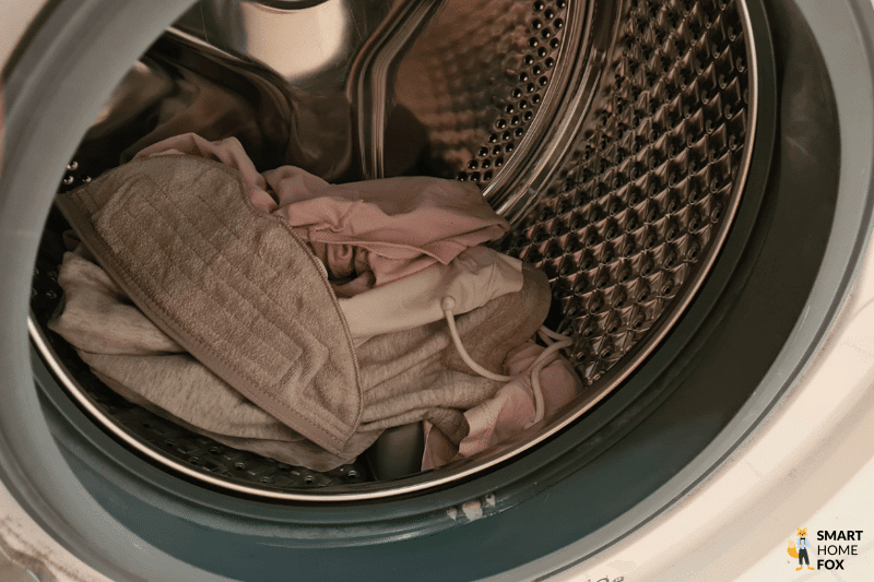 The Roborock S7 MaxV mop is washed in the washing machine.